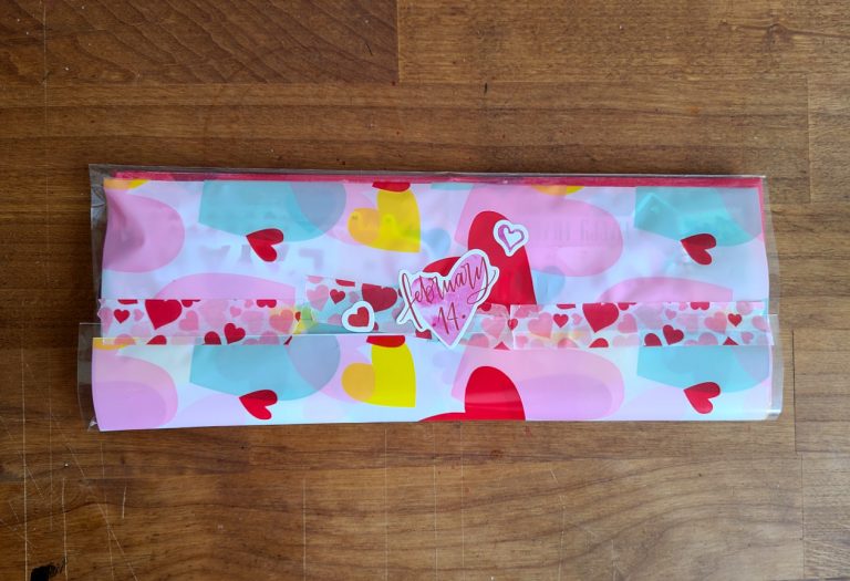 Valentines happy mail wrapped in heart bag